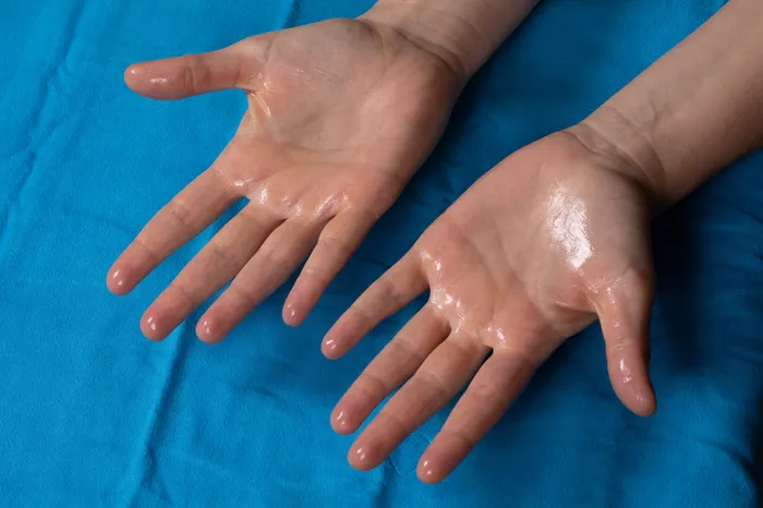 Close-up of sweaty hands