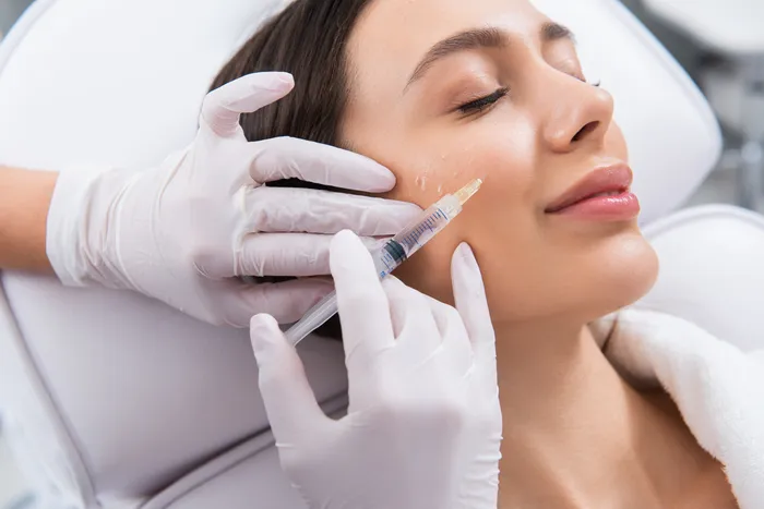 Filler Being Injected into a female patient