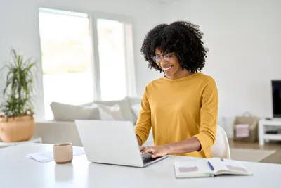 A woman participating in a telehealth appointment