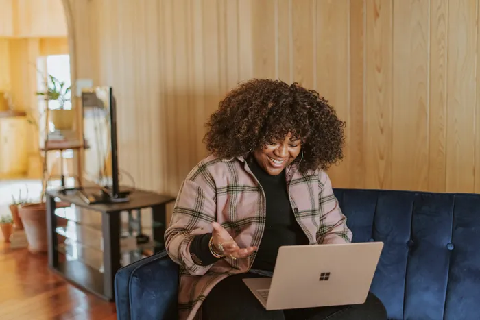 A woman participating in a telehealth appointment